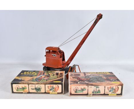 A UNBOXED AND PLAYWORN TRI-ANG JONES KL44 CRANE, red painted with a black base, in need of re-stringing, with a loose orange 
