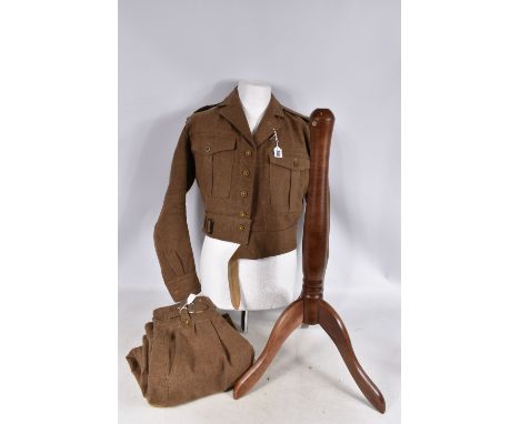 A 1949 PATTERN ARMY BATTLE DRESS BLOUSE AND TROUSERS, the blouse is dated 1955 and is a size 9 so fits a soldier 5ft 7 to 5ft