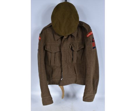 A WWII 1940 DATED BATTLE DRESS JACKET AND BERET, the jacket is a 1937 pattern blouse and dated clearly inside 1940, it is a s