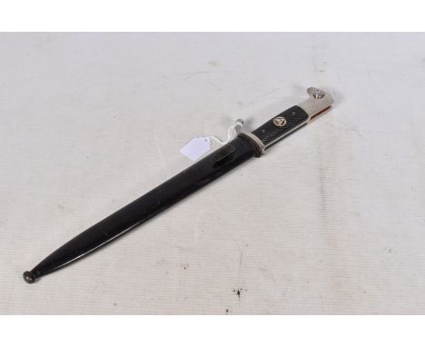 A GERMAN DRESS DAGGER MADE BY WKC, this has the black grip and black scabbard, the blade has no motto but has the knights hea