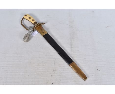 A 20TH CENTURY GERMAN HUNTERS DAGGER, this features hunting scenes on both sides of the blade and a gilt brass hilt with ivor