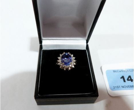 A blue tourmaline cluster ring. In gold marked 375. Size M. 3g gross