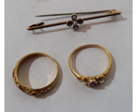 A gem set ring, another ring with vacant settings and a 9ct bar brooch 