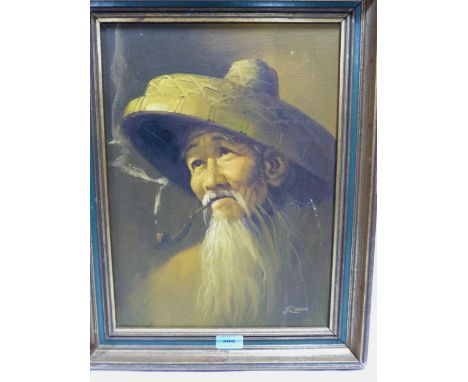 L. CHAN. CHINESE 20TH CENTURY An elderly chinaman smoking a pipe. Signed. Oil on board 17' x 12½'