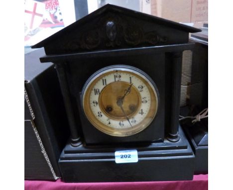 A French black slate architectural cased mantle clock. 11½' high. Loss to top