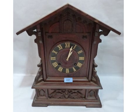 A ' Black Forest' mantle cuckoo clock. 17½' high. Movement runs, bellows A.F.