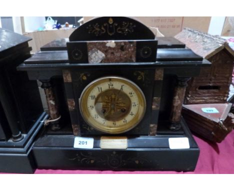 An early 20th century French slate and marble architectural cased mantle clock. 12' high