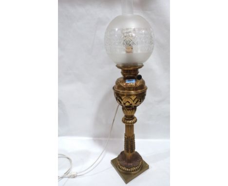 A Victorian brass oillamp with cut and frosted shade. Converted to electric light