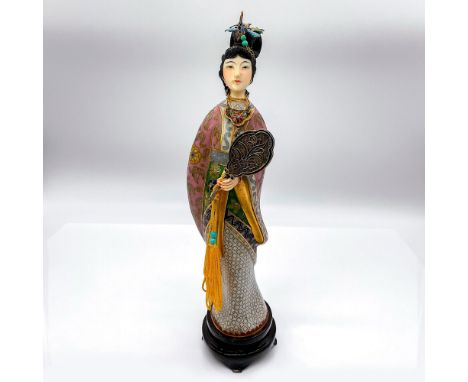 Handmade statuette of a lovely woman in a floral pink and white hanfu with gilded accents holding a brass hand fan. Embellish