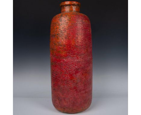 Stunning large ceramic vase, expertly crafted by hand, featuring mesmerizing wavy lines. Vibrantly glazed in rich reds, orang