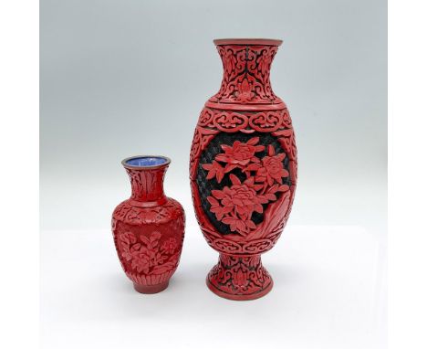 Two beautiful vessels with a red carved wooden exterior, and a blue brass enamel interior. Each piece features blossomed flow
