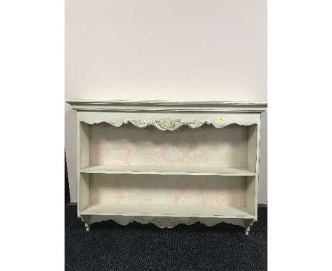 A shabby chic wall shelf 