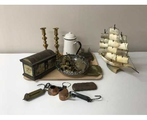 Two trays of brass and copper ware, antique domed topped tin, balance scales, etc 