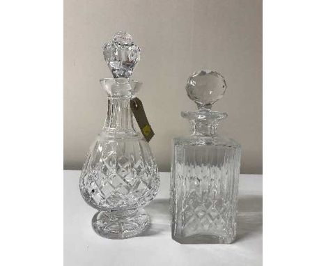 A Edinburgh crystal decanter and stopper, with a Waterford crystal decanter and stopper