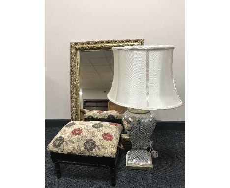 A mosaic table lamp and shade, footstool and gilt framed mirror 