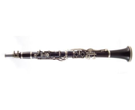 Clarinet in Eb, Blackwood or Rosewood , simple system fitted with thirteen keys, with wood box early 20th century, 49cm long