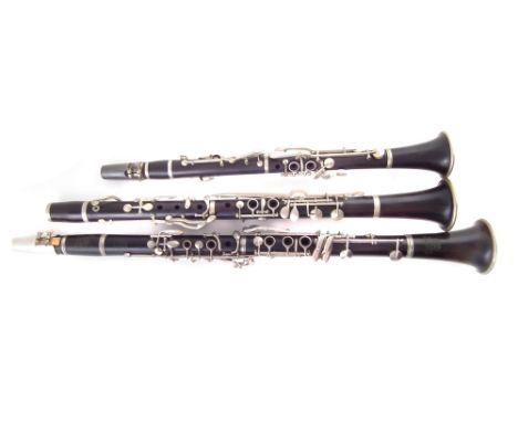 Selmer Studente Console Bb clarinet , with original case, also a Chas. E Foote clarinet and one other clarinet with leather c
