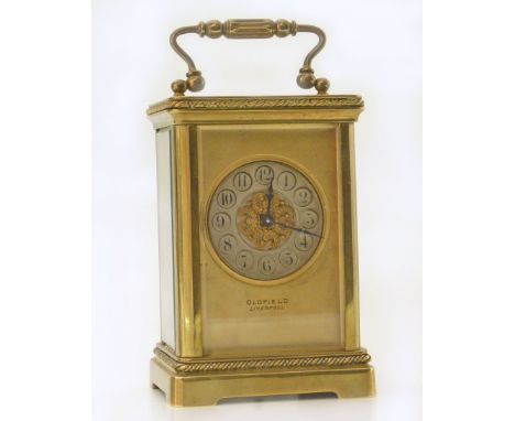 Brass carriage clock by Oldfield, Liverpool. Condition reports are not available for our Interiors sales.