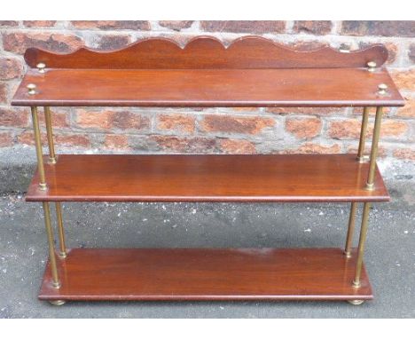 19th century campaign three tier wall shelf with brass columns and finials. Condition reports are not available for our Inter
