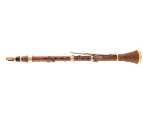 Boxwood clarinet by Key London c.1850, with ivory fittings and brass keys, 59cm long