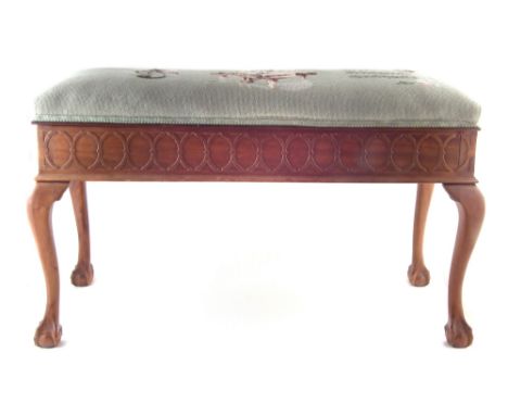 Mahogany duet piano stool, with lift up top upholstered with a musical theme tapestry, supported on ball and claw feet, 94cm 
