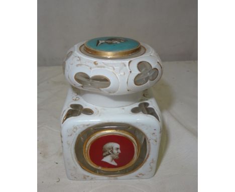A Bohemian cut glass inkwell overlaid in white enamel and gilt decoration: each side and lid with panels depicting Greek char