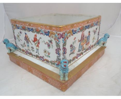 A Quinlong style famille rose planter decorated with European subjects