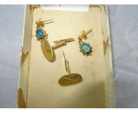 A pair of 9ct cufflinks; together with an opal earring