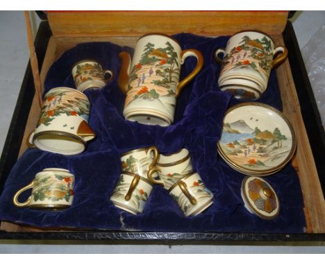 A Japanese Satsuma tea set:

Taisho period

To include six cups and saucers, teapot, sugar pot and milk jug.  All decorated w
