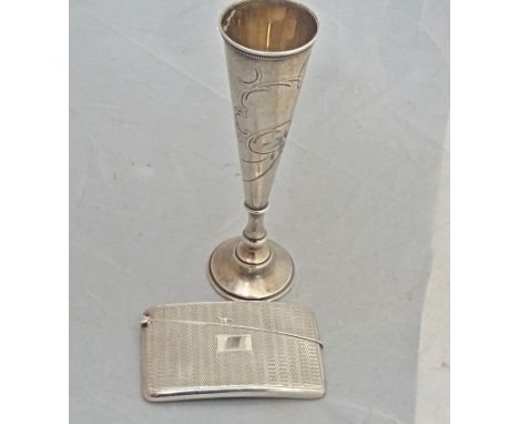 A Russian silver kiddush cup, 1908 -1917 period, engraved with scrolling foliage, and a silver engine-turned pocket card case