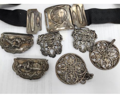 A late Victorian Silver Art Noveau buckle and leather belt, by Messrs Hutton and Sons, after a design by Kate Harris, London 