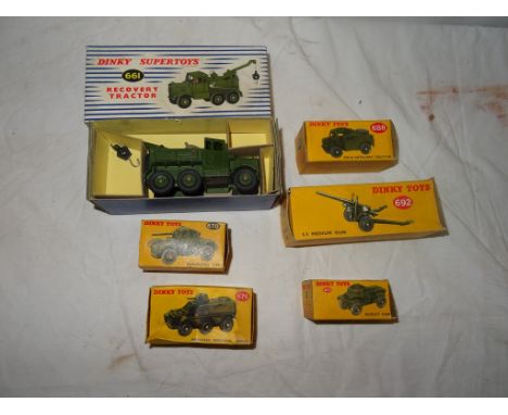 A collection of boxed Dinky army vehicles to inc Dinky Supertoys Recovery Tractor No.661, 55. Medium Gun No.692, Field Artill