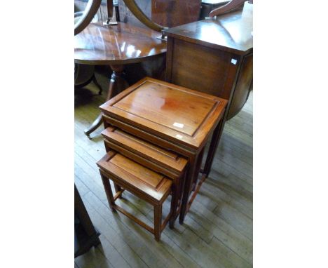 Three Oriental hardwood tables, also an Oriental circular topped drum table the single column on tripod base, together with a