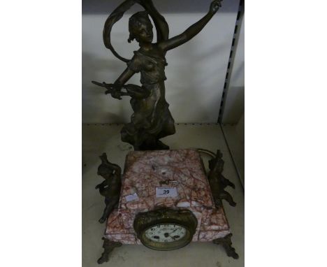 A late 19th/early 20th Century French mantel clock with marble case and spelter figural mounts 