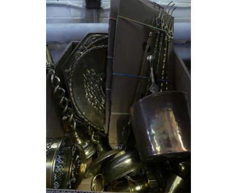 A box of assorted mix brasswares to include candlesticks, fire tools, various pressed brass plates, copper kettle and other m