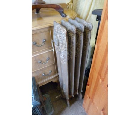 A 19th Century cast iron gold painted four panel radiator 
