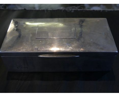 A London hallmarked silver cigarette case with wood lined interior 