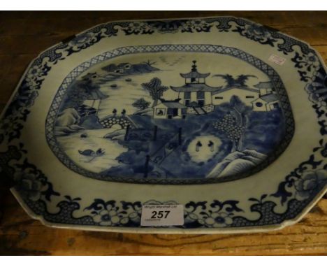 A 19th Century Chinese Nanking style octagonal platter, decorated with central panel.   CONDITION REPORT:  Some minor surface