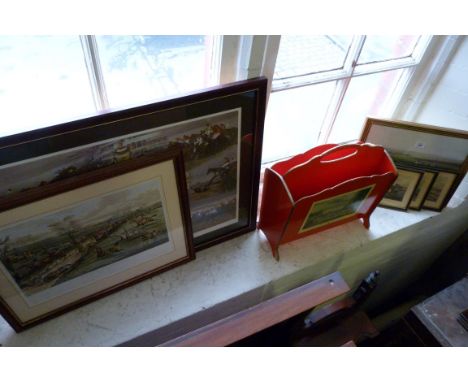A framed Grand National print 1927, three framed coloured steeple chasing prints and a red magazine rack decorated with hunti