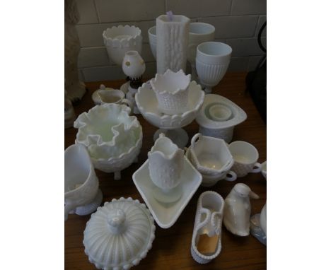 A mixed lot of various Victorian milk glass wares to include a range of various goblets, vases, baskets and other together wi