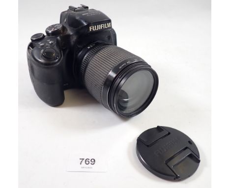 A Fujifilm Finepix HS50 EXR digital camera with 24-1000mm lens, cased