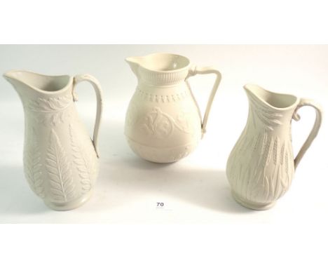 A Victorian press moulded jug by Cobridge and two smaller ones by Dudson, tallest 21cm