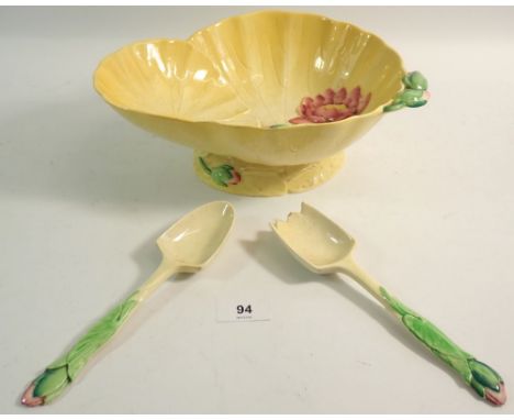 A Carlton Ware yellow lily leaf salad bowl and servers 