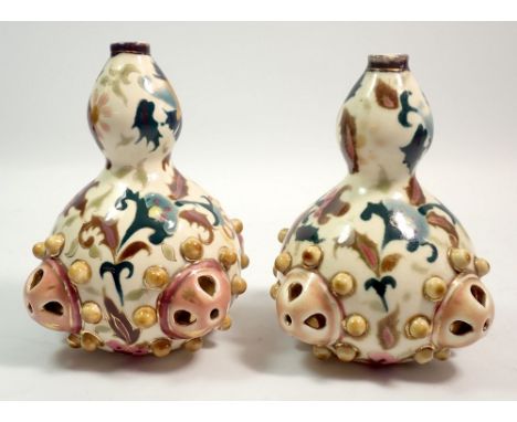 A pair of Zsolnay vases with reticulated decoration, 12cm