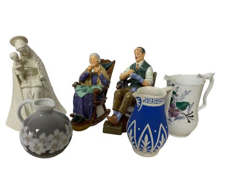 Two Royal Doulton figures comprising The Bachelor HN231 and A Stitch In Time HN2352, Bing &amp; Grondahl of Copenhagen jug, H