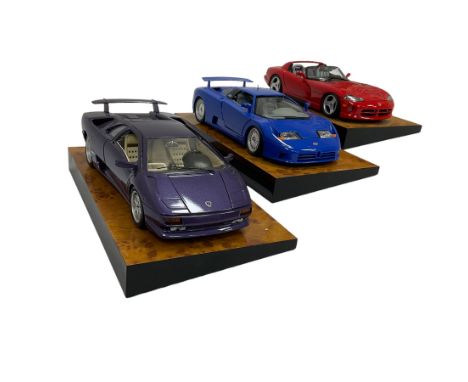 Three The Crestley Collection 1:18 scale model cars comprising Dodge Viper (1992), Lamborghini Diablo (1990) and Bugatti EB 1