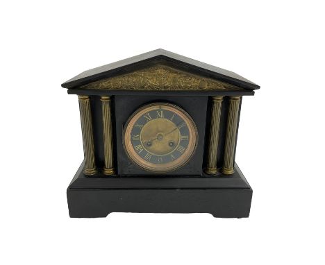 French slate mantle clock striking on a gong. 