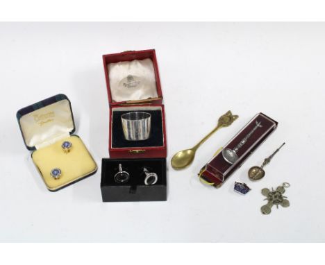 Caithness Glass cufflinks, silver napkin ring, commemorative spoons, pewter cross pendant, etc (a lot|) 