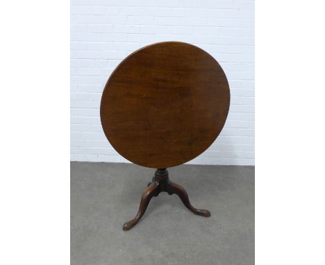 19th century mahogany tilt top table, plain circular top on a pedestal base with splayed legs and pad feet, 83 x 73cm. 