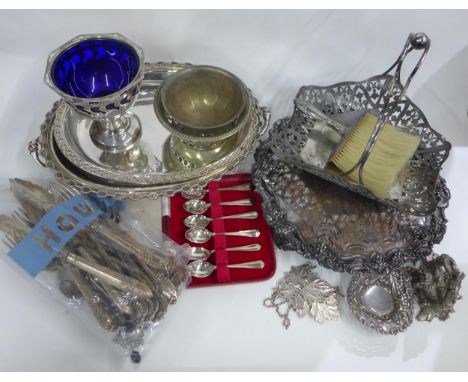 Box containing a quantity of silver plated items to include&nbsp; sugar basin with blue glass liner, teaspoons, swing handled